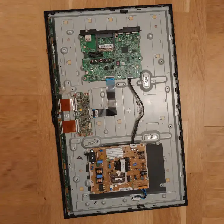 Technician completing a same-day Samsung TV motherboard repair